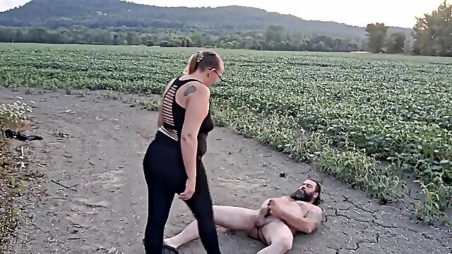 Couple humiliates slave with shoejob and outdoor ballbusting