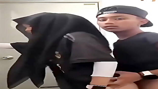 Tempting Indonesian schoolgirl gives blowjob in public toilet