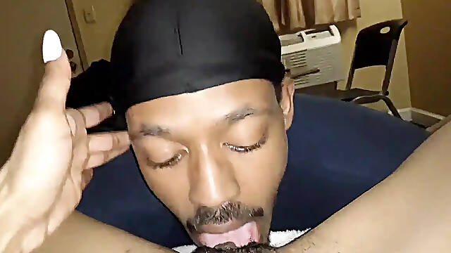 Ebony redbone eats hairy pussy like a pro